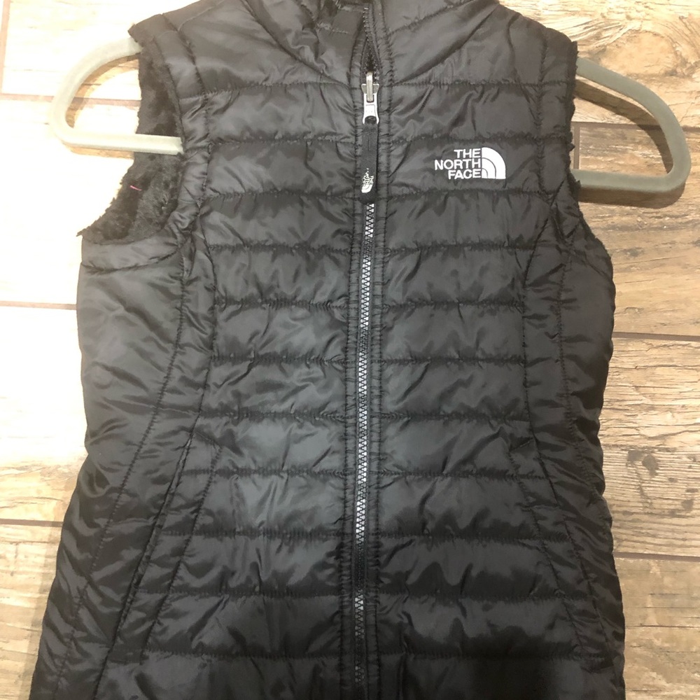 NorthFace vest. Reversible. Fur inside. Very well taken care of.